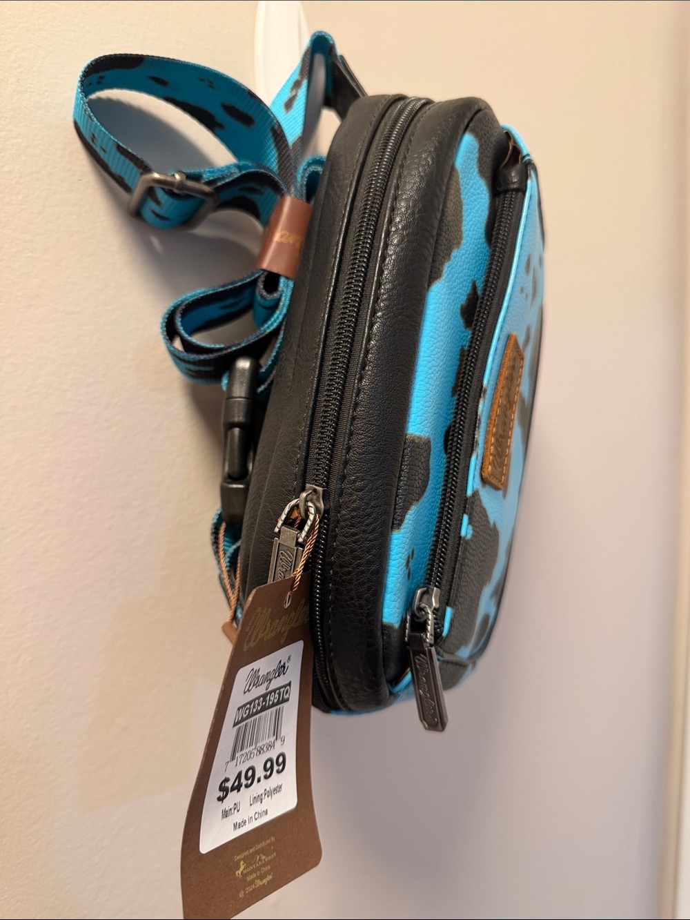 Wrangler Turquoise and Black Cowhide-Print Crossbody Belt Bag - Picture 3 of 3